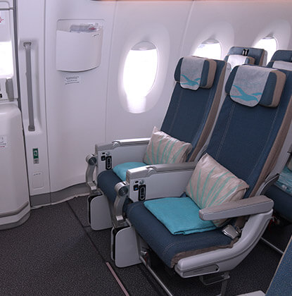 Choose an exit seat for maximum comfort on your next travel