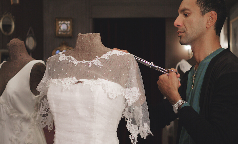 Perry Ah Why working on one of his bridal creations